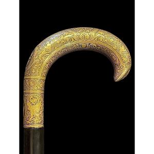 Stick With Bronze Handle Engraved With Stylized Plant And Geometric Motifs And Initials. 