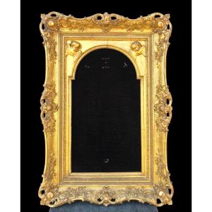 Christ Frame In Carved Wood And Gold Leaf With Stucco Applications With Floral Decorations 