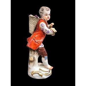 Porcelain Figurine With Male Figure With Basket. Meissen. 