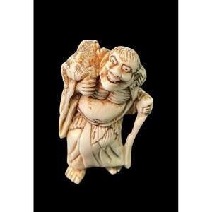 Ivory Netsuke Depicting A Male Figure 