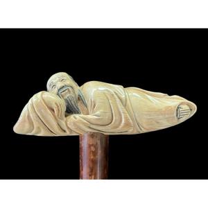 Ivory-handled Walking Stick Depicting A Reclining Japanese Man. 