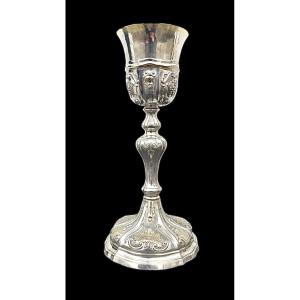 Embossed Silver Chalice With Tapered Globular Body With Grape Bunch And Rocaille Motifs. 