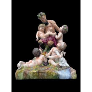 Polychrome Porcelain Group With Faun And Cherubs In A Rural Setting. Ginori 