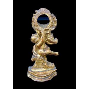 Carved Wooden Clock Stand With Gold Leaf Depicting A Child 