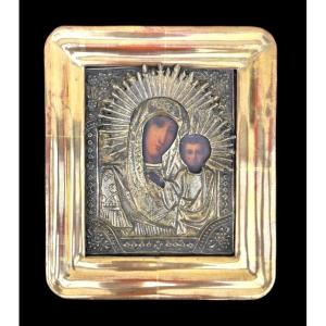 Icon Depicting Madonna And Child With Painted Face And Silver Foil Structure. Russia. 