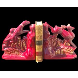 Pair Of Earthenware Bookends Depicting Dogs Chasing A Deer. 