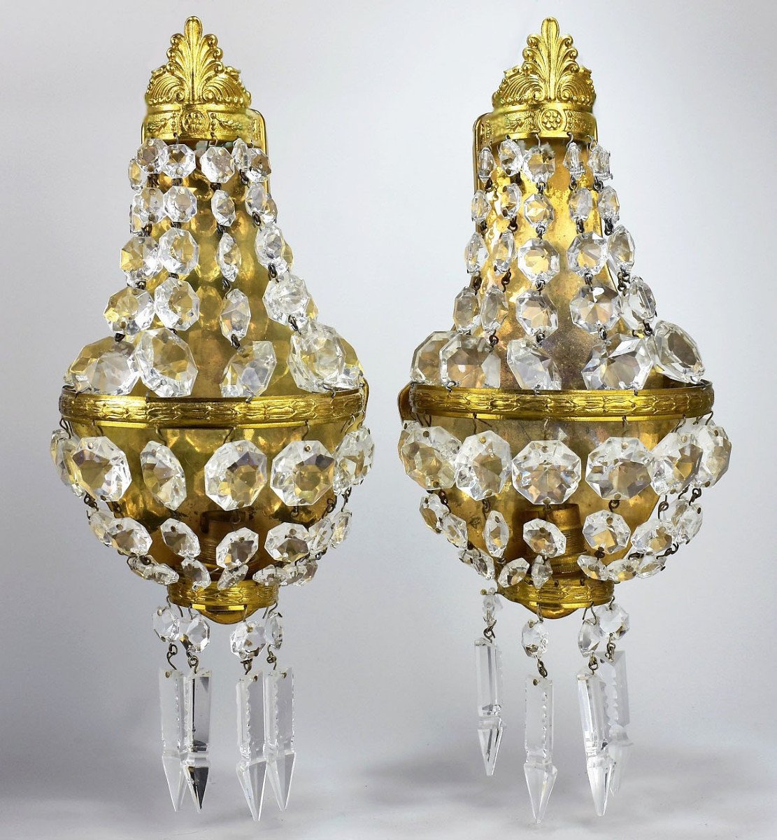 Pair Of Golden Brass And Crystal Sconces