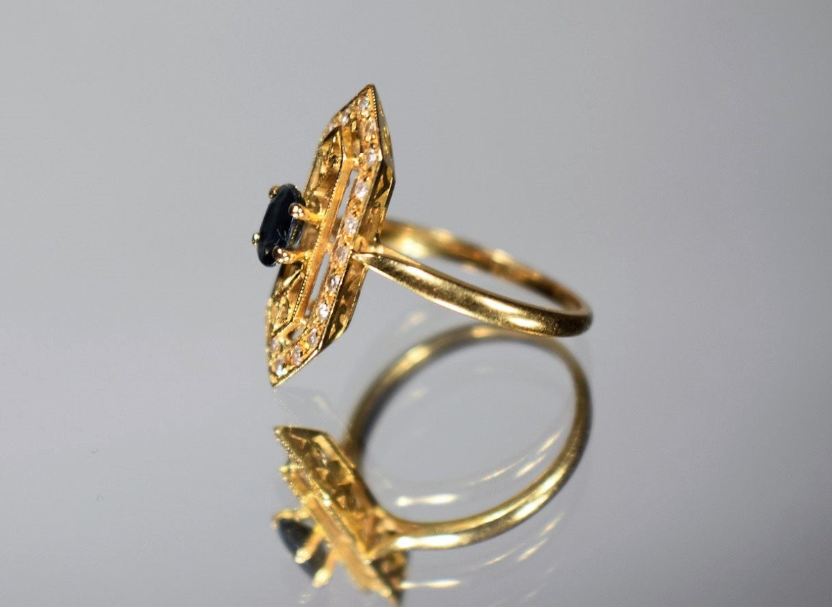 Gold Ring With Sapphire And Diamonds-photo-3