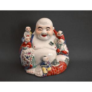 Polychrome Porcelain Laughing Buddha Surrounded By Five Children. 