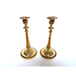 Claude Galle Attributed To A Pair Of Bronze Flambeau Candlesticks From The Empire Period