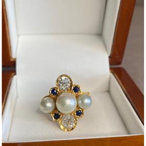 Ring In 18 Carat Yellow Gold, Diamonds, Pearls, Sapphires.