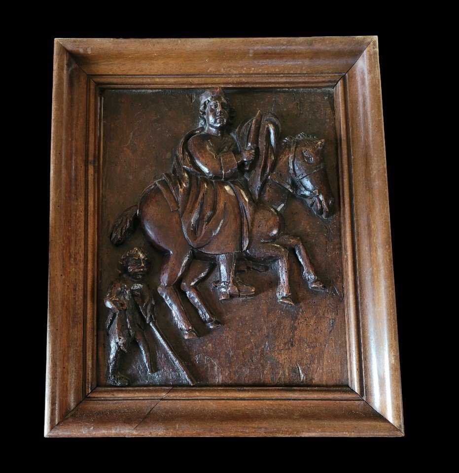 17th Century Carved Oak Panel Depicting A Horseman And A Leper.