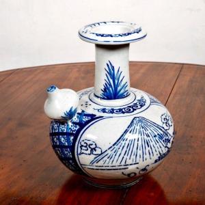A Japanese Blue And White Arita Ceramic Kendi, Edo Period.