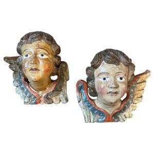 A Pair Of 1750s Baroque Lacquered Wood Sculptures Of Angel Heads With Wings