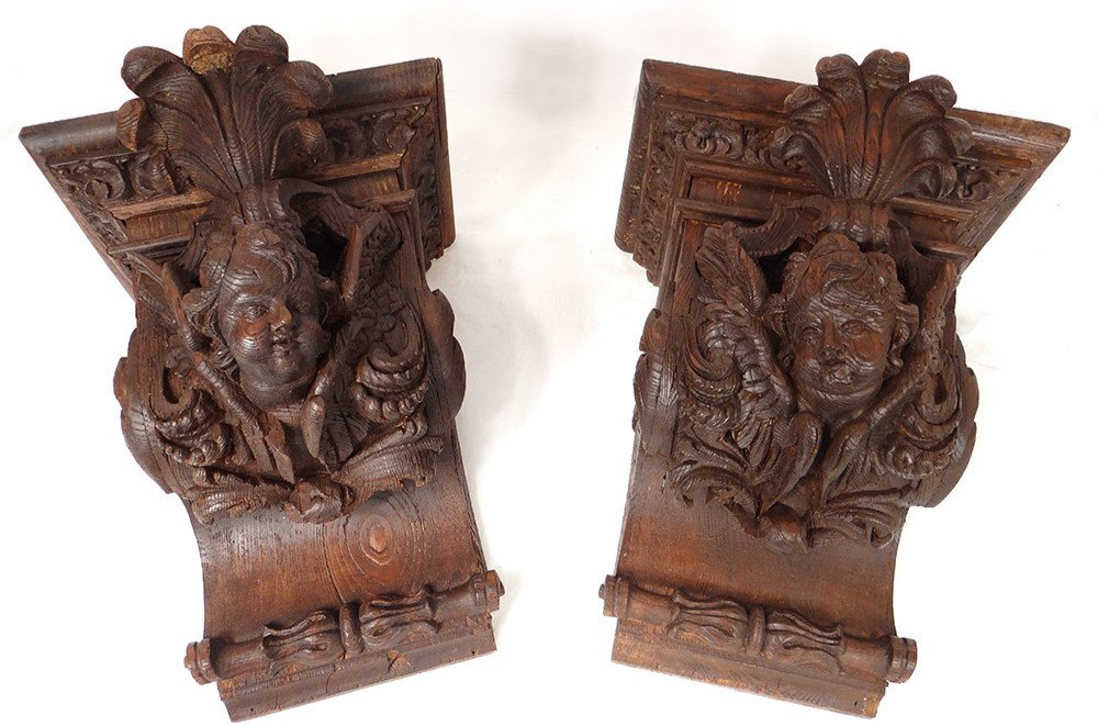 Pair Of Wall Consoles In Carved Wood With Cherub Heads And Putti And Foliage From The 19th Century