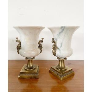 A Pair Of Vases With Dolphins