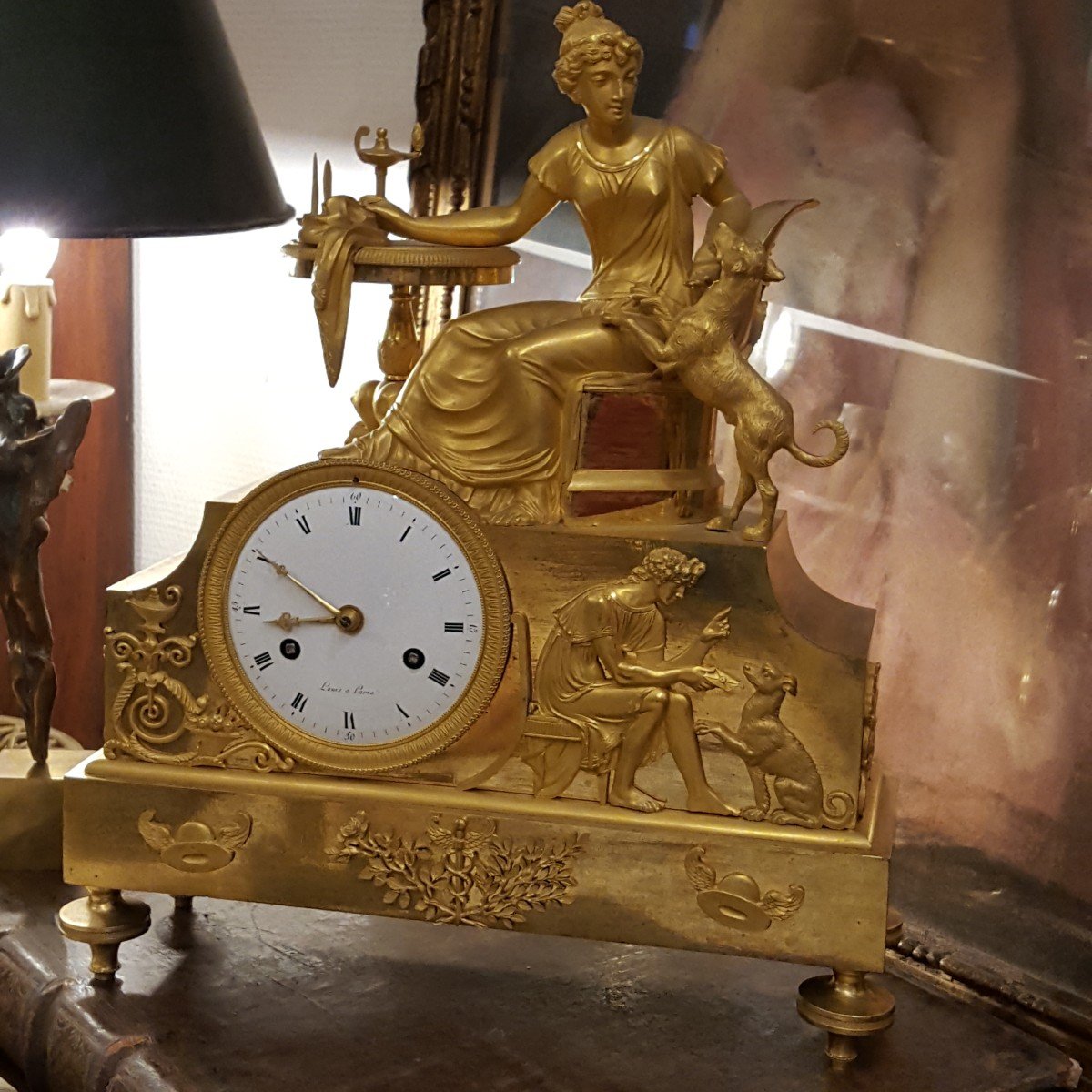 Empire: Gilt Bronze Clock "the Young Woman And Her Dog".