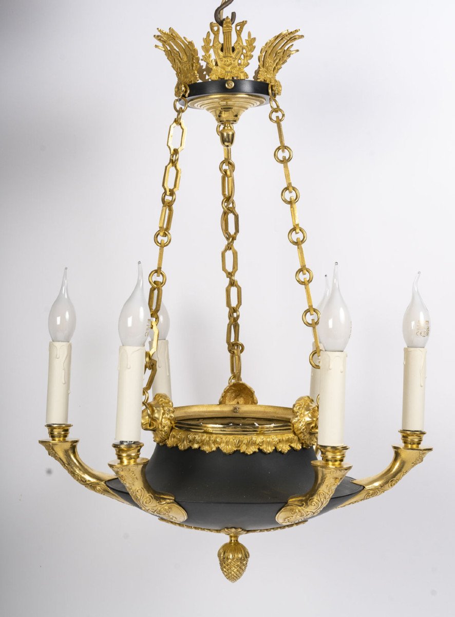 A Chandelier In The 1st Empire Style.