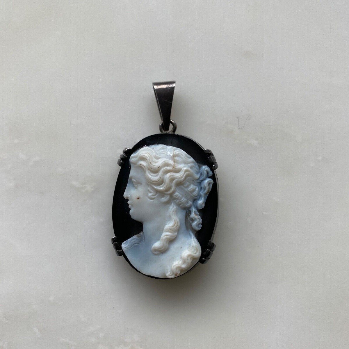 Rare Antique Cameo Of A Woman's Profile On A Black Background