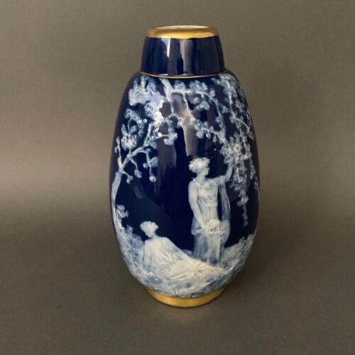 Vase en porcelaine de Limoges Marcel Chaufriasse fond bleu-photo-2