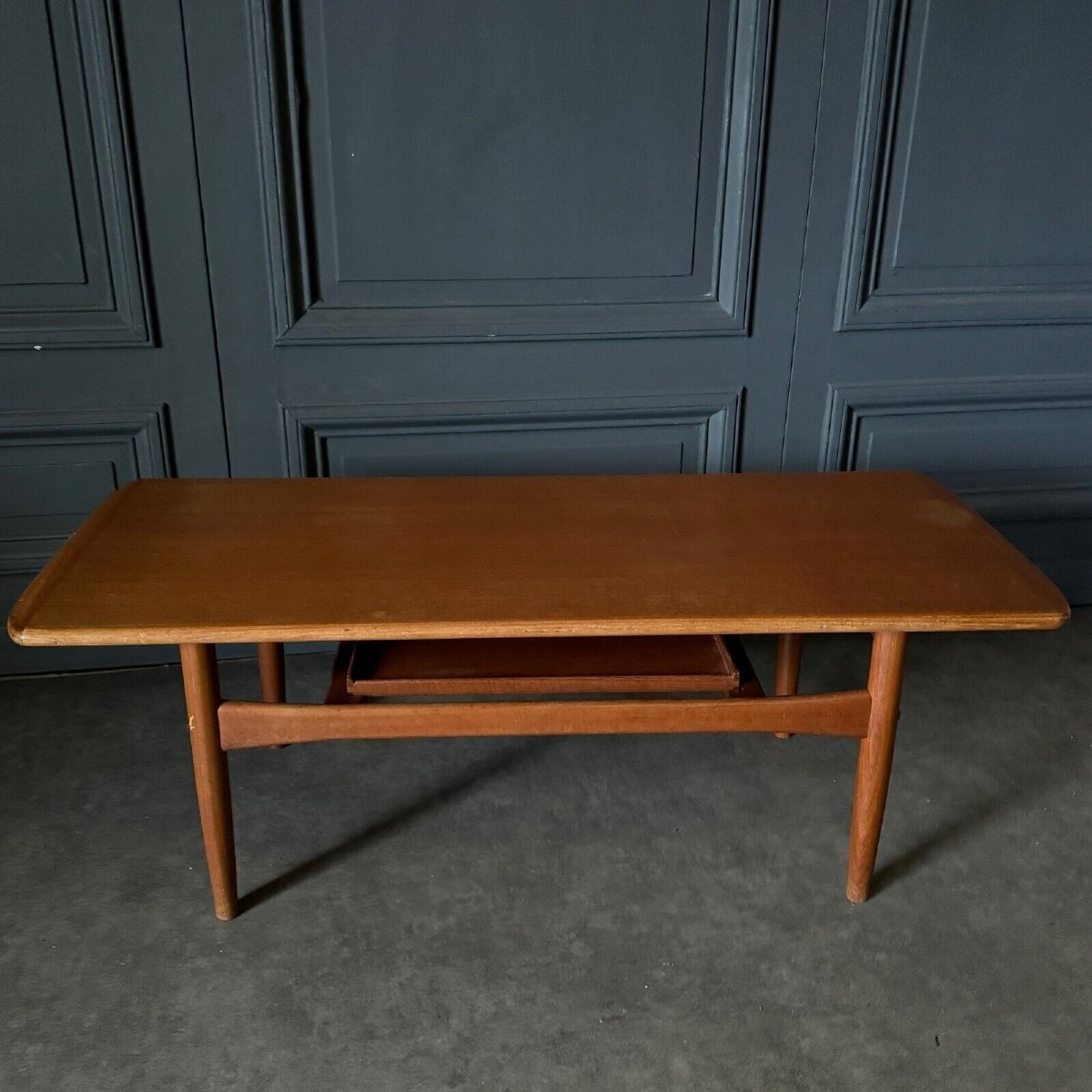 Table basse scandinave en teck comportant un plateau 1960