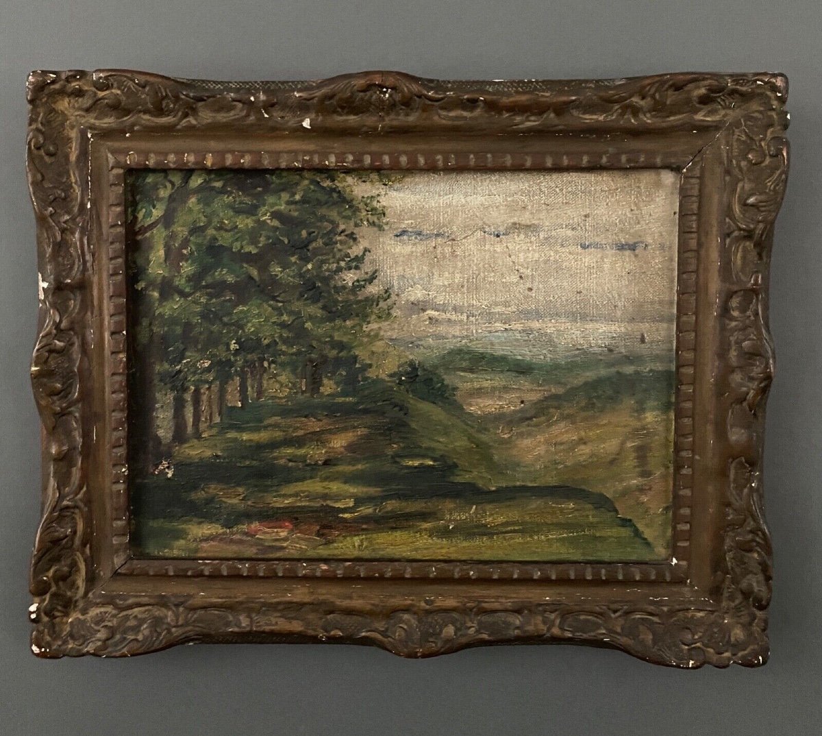 Huile sur toile représentant un paysage forestier début XXe cadre stuc