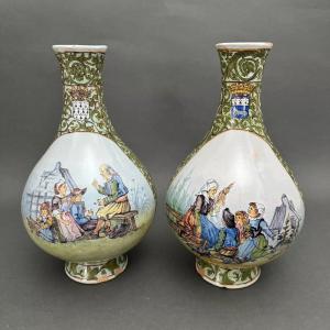 Paire de vases Porquier-Beau en faïence décor de personnages