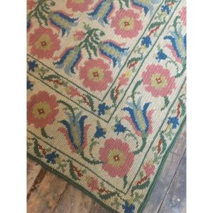 Point Rug With Floral Decor