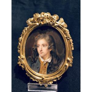 Oval-shaped Miniature Depicting A Young Man In A Blue Jacket: French School Of The 19th Century 