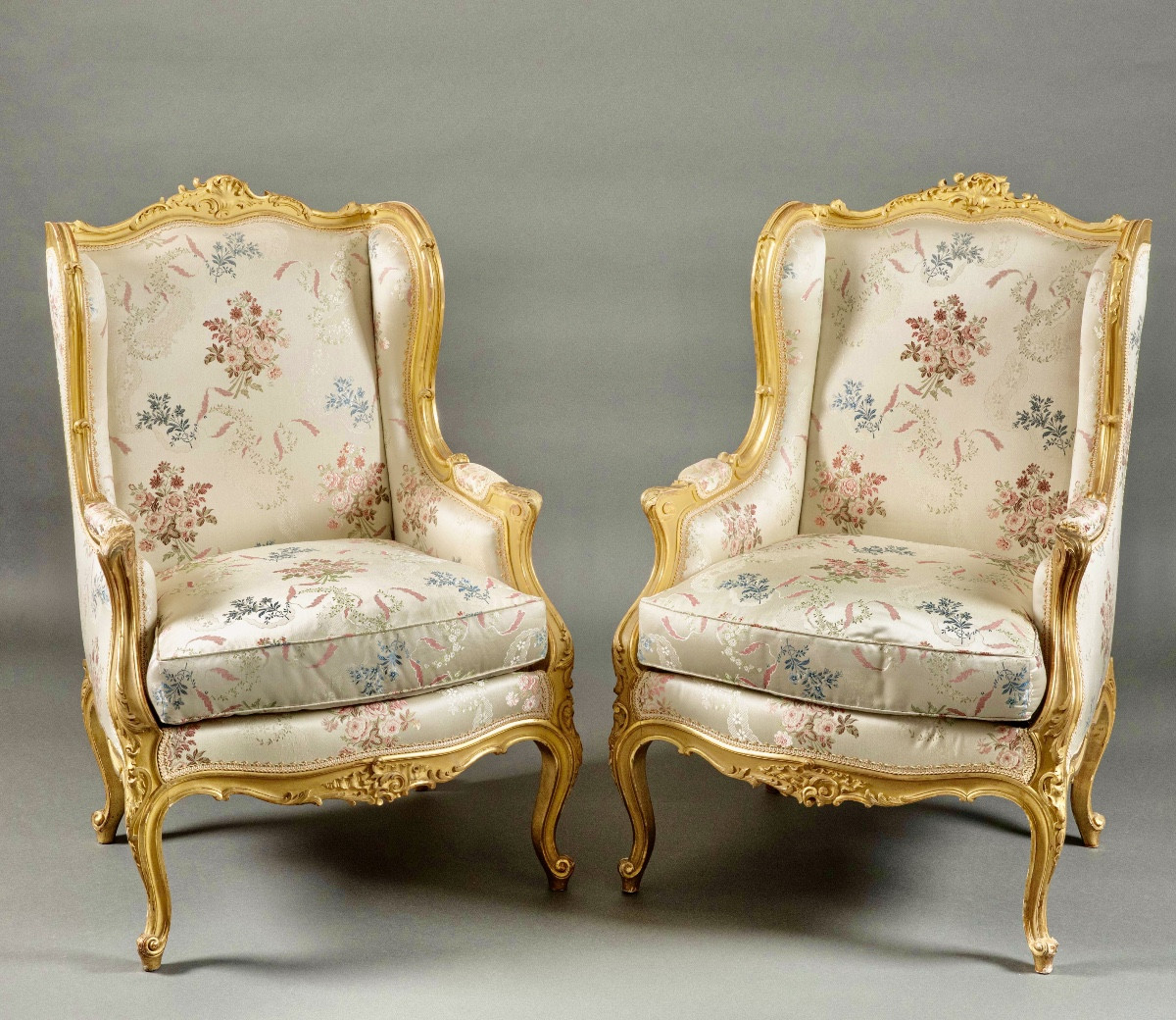 Pair Of Louis XV Style Bergeres In Gilded Wood 