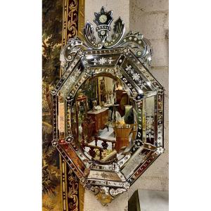 Important Venetian Octagonal Beveled Mirror With Beads.