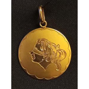 Pendentif "L’amour est aveugle" or jaune 18kt 