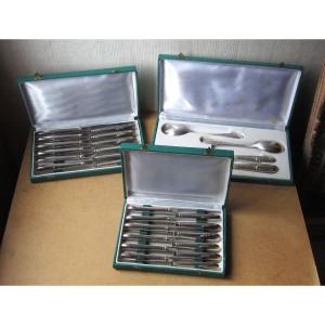 12 Table Knives, 12 Dessert Knives And 2 Pairs Of Silver Plated Metal Serving Cutlery