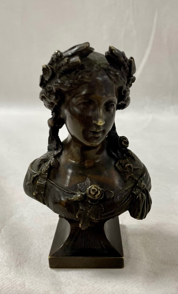 Small Bust Of A Young Woman Crowned With Flowers