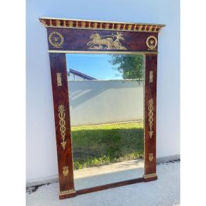 GRAND MIROIR DE STYLE EMPIRE EN BOIS DORE XIX SIECLE