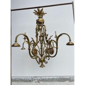 GRAND LUSTRE EN BRONZE DE STYLE LOUIS XVI