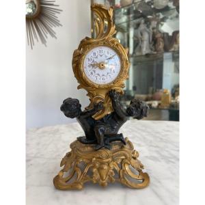 Louis XV Style Clock In Bronze With Brown And Gold Patina With Rocaille Decor 