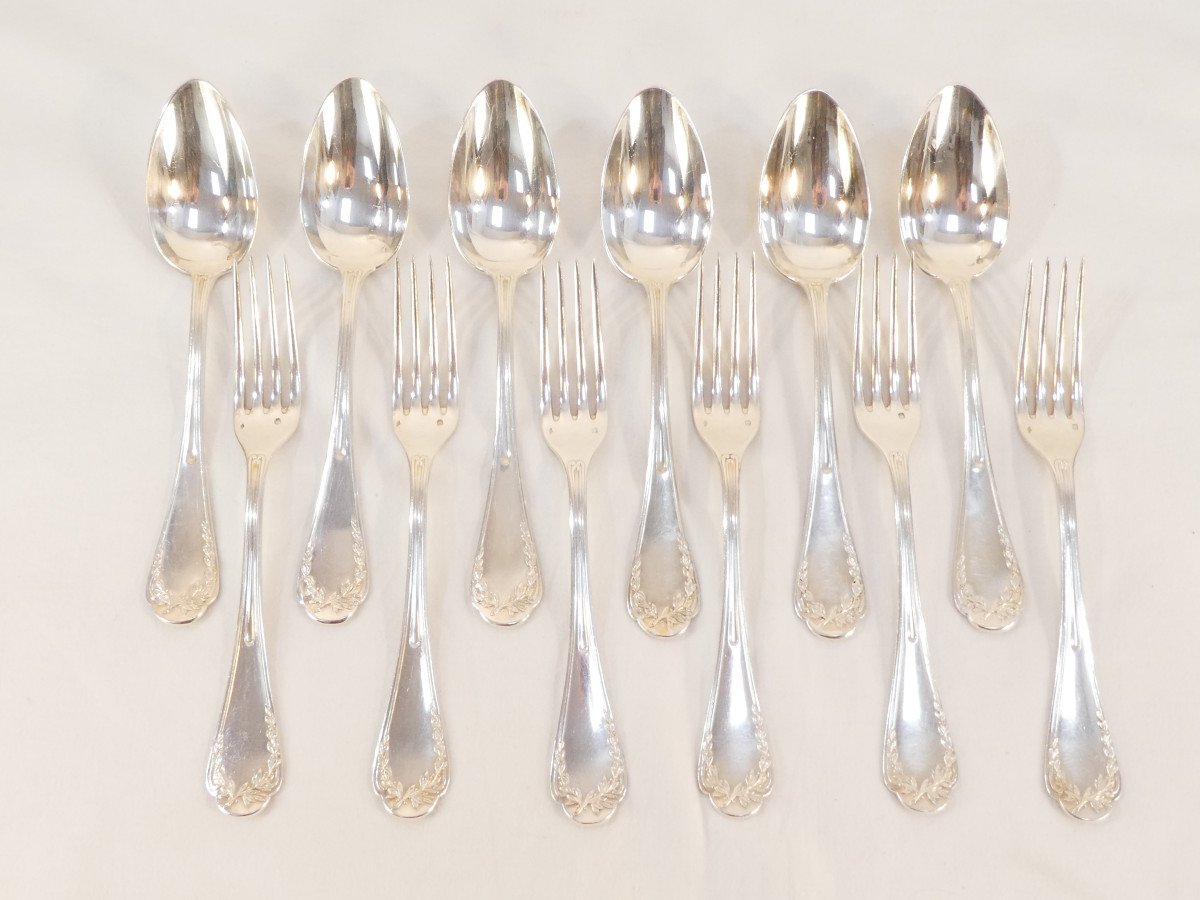 6 fourchettes et 6 cuilleres en ARGENT MASSIF décor aux branches de Lauriers