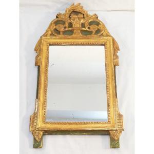 Miroir en bois et stuc doré d'époque 19eme de style LOUIS XVI