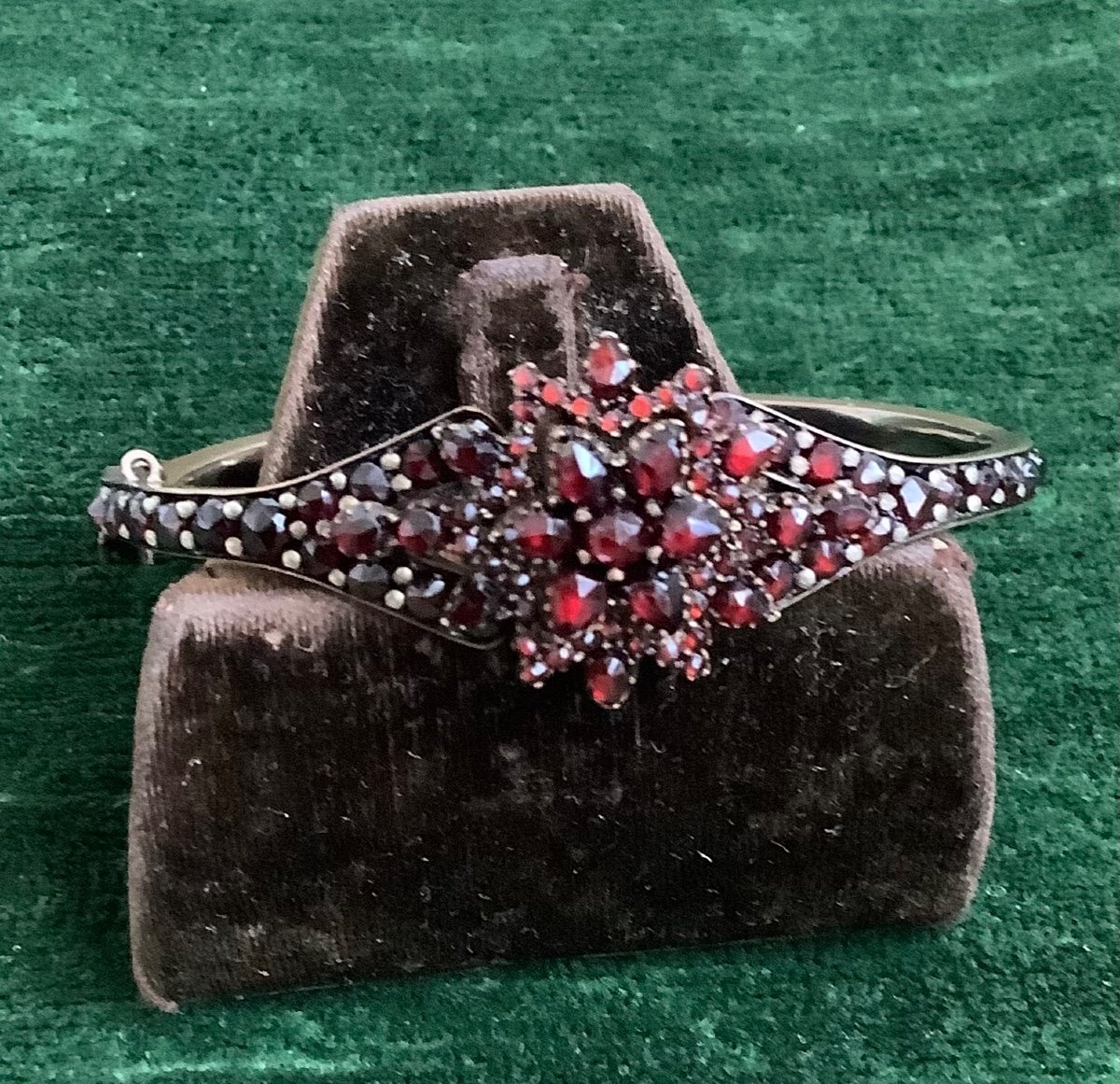 A Garnet Bracelet In A Metal Setting -photo-2