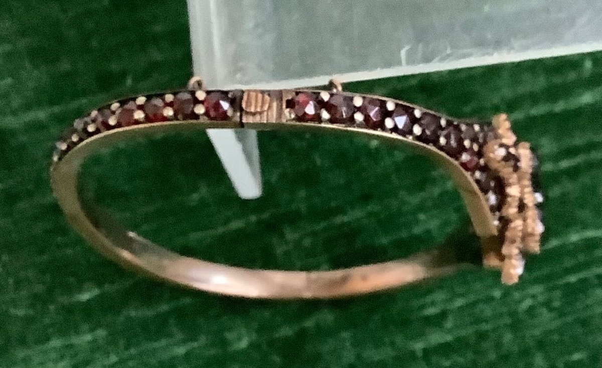 A Garnet Bracelet In A Metal Setting -photo-4