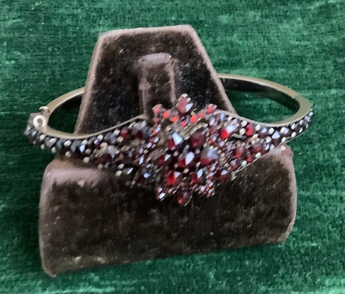 A Garnet Bracelet In A Metal Setting 