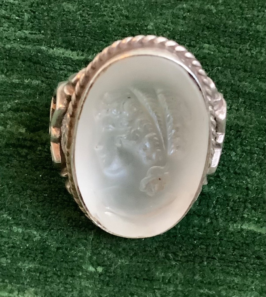 A Silver Ring With Glass Inlay Of A Woman's Profile -photo-2