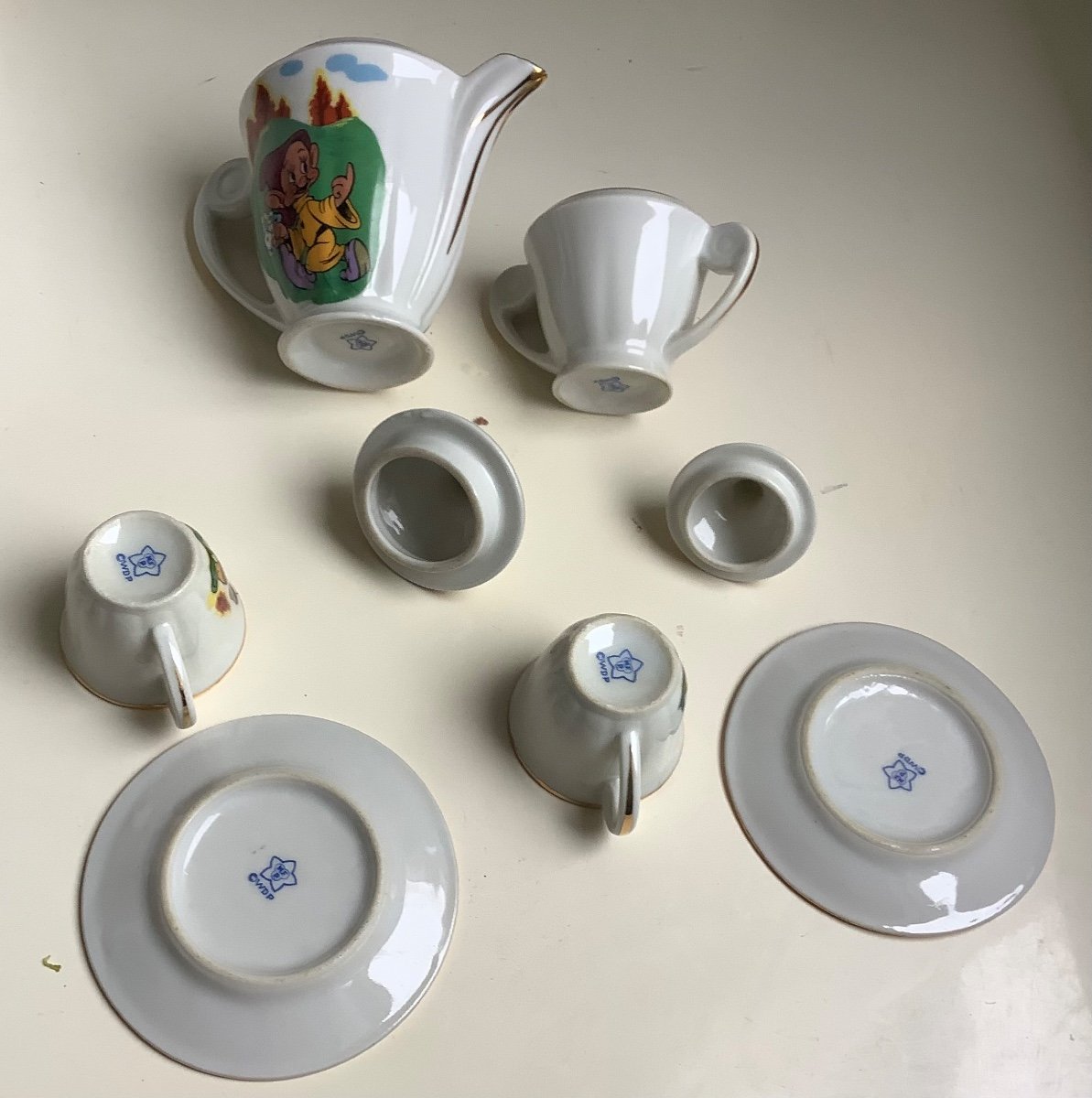 A Porcelain Dinner Set Decorated With Snow White And 7 Dwarfs -photo-1