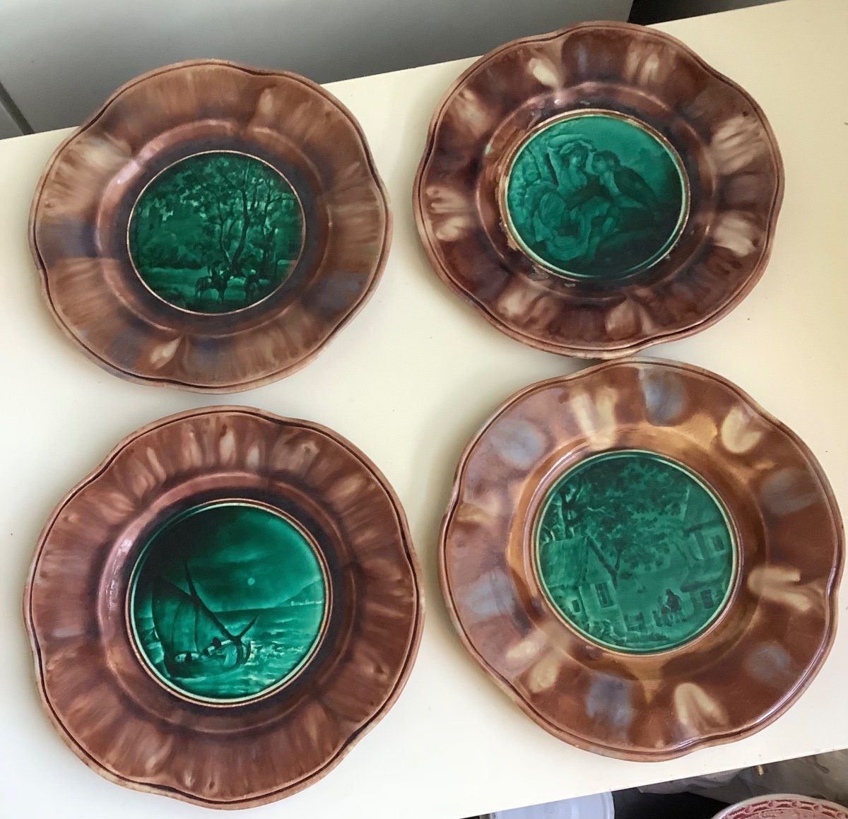 4 Plates Of Rebel Earthenware 