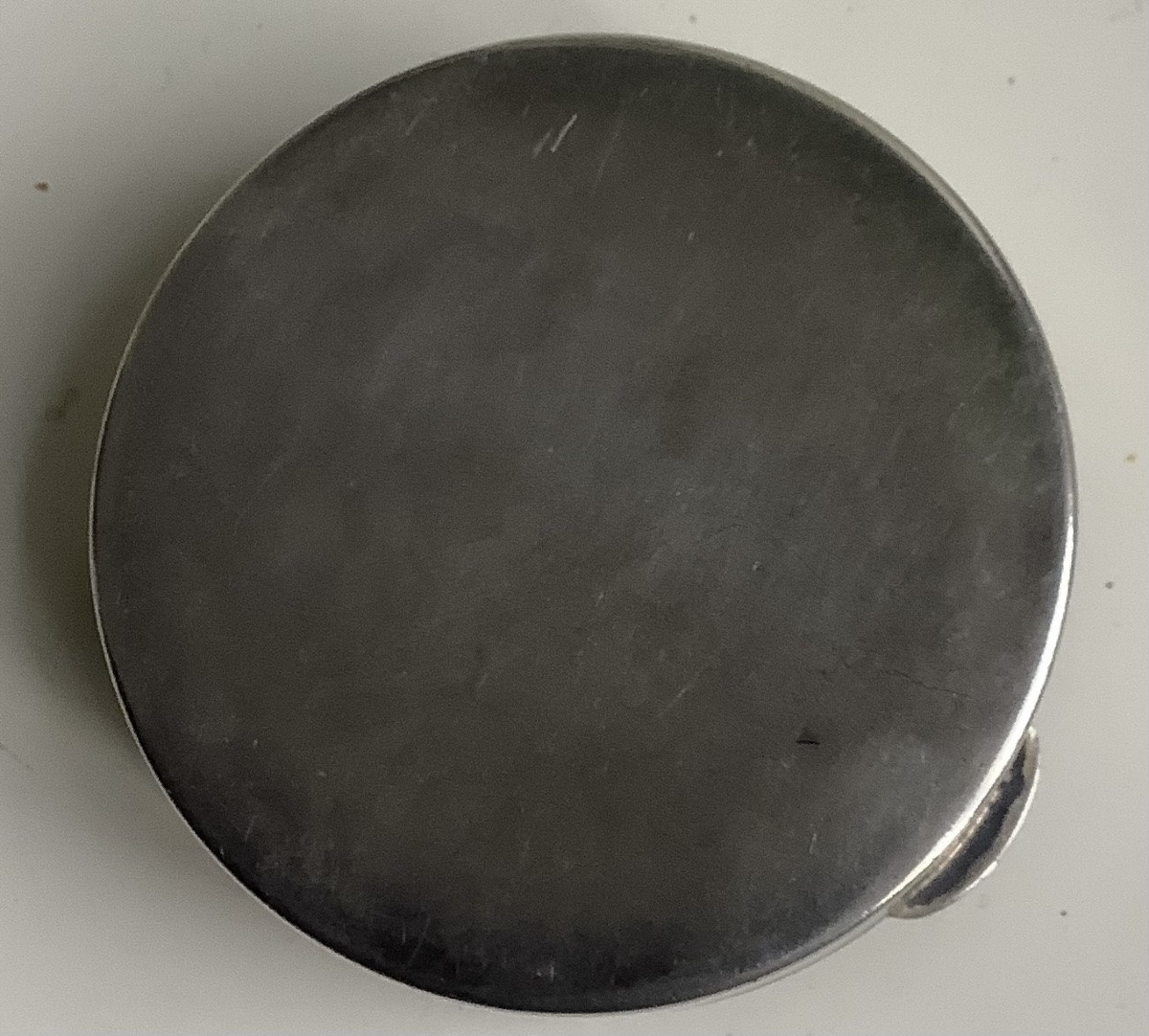 A Round Silver Box Decorated With Flowers-photo-5