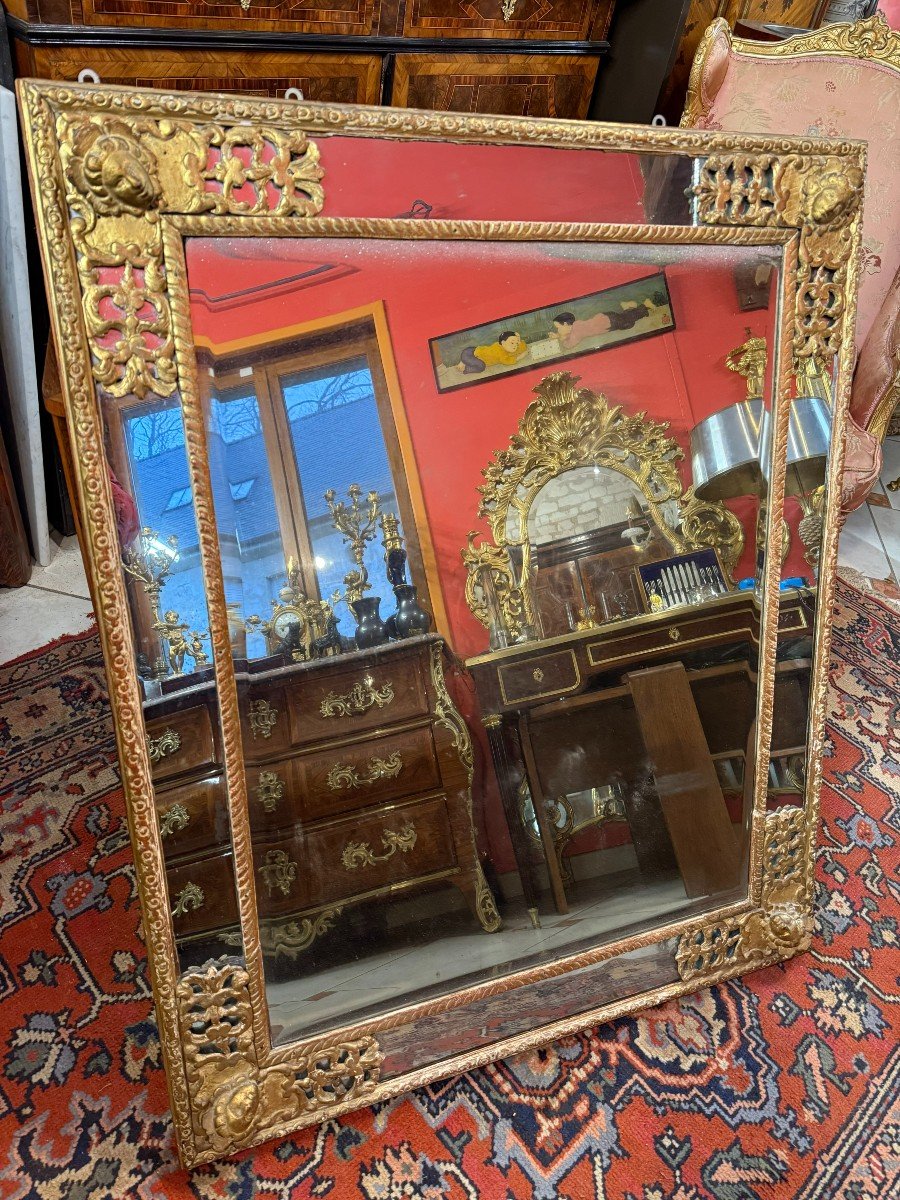 MIROIR REGENCE A PARECLOSES EN BOIS DORE D'EPOQUE XVIIIème