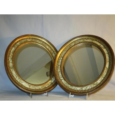 PAIRE DE MIROIRS en bois doré et peints en trompe-l'oeil XIXe miroir ovale