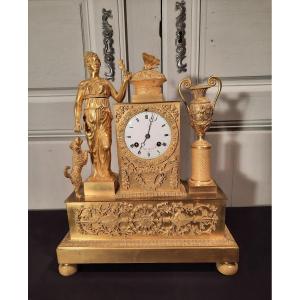 Empire Period Clock In Gilt Bronze On The Theme Of Peace And Loyalty.