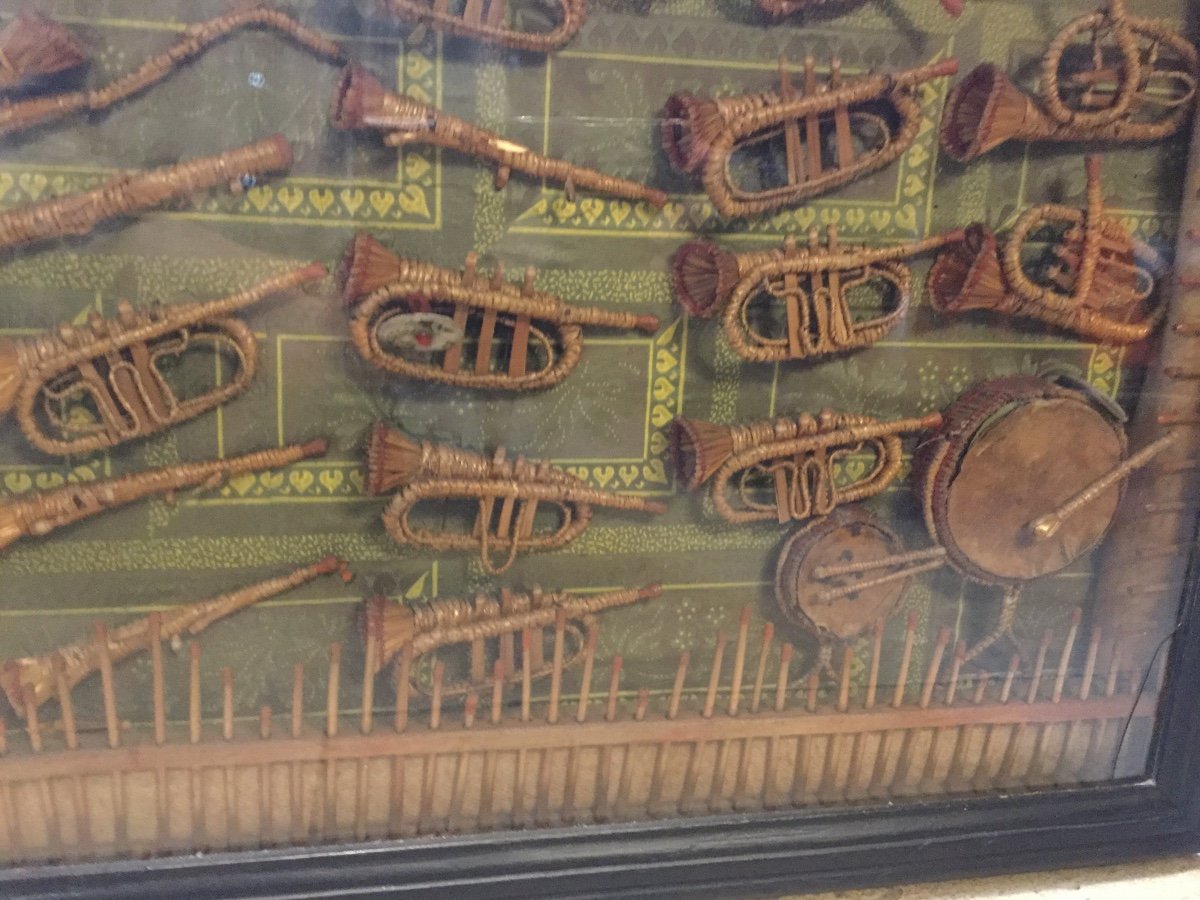 Curiosity . A Frame Containing Various Musical Instruments Made Of Straw And Rattan. Dated 1893-photo-4